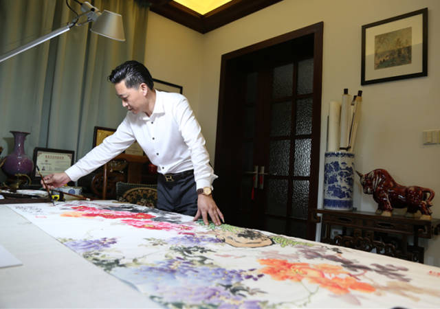 翰墨传情 丹心筑梦——记中国书画院副院长周萍